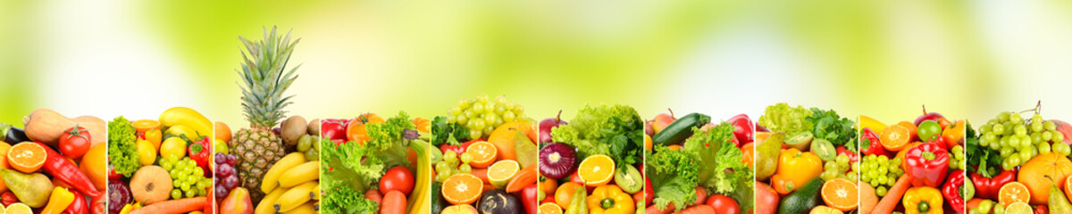 Bright vegetables and fruits separated by vertical lines on green