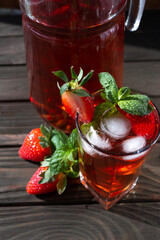 strawberry lemonade with mint on a wooden background