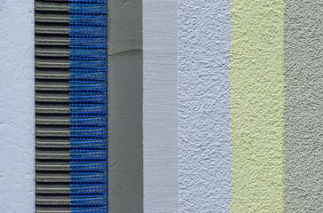Close-up of external wall insulation systems and facade cladding.