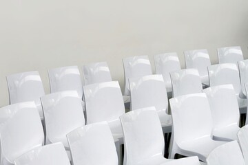 Empty audience seats arranged in rows selective foreground focus