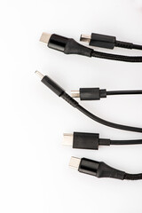 Black USB cable on white background. USB and USB-mini cable connectors close-up. 