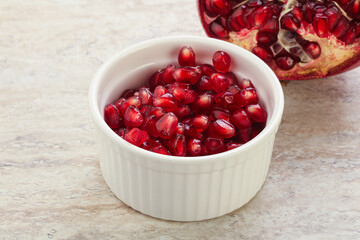 Ripe red Pomegranate seeds in the bowl