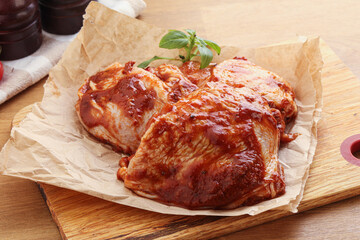 Marinated chicken leg in tomato sauce