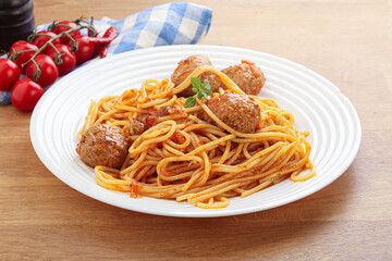 Spaghetti with meatball in tomato sause