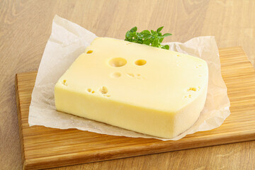 Maasdam cheese over the board