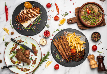 Set Georgian dishes chakapuli, shish kebab and meat chop steak with walnut sauce. banner, menu, recipe place for text, top view