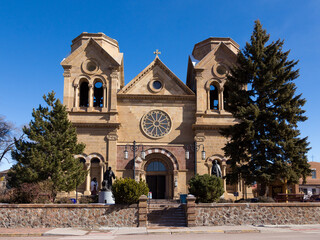 The facade of the 1887 romanesque revival Cathedral Basilica of Saint Francis of Assisi in downtown...