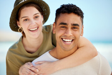 He carries me when I need support. Shot of a young couple enjoying a day at the beach.