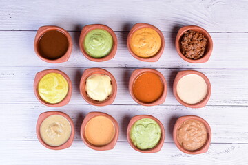 Mix of exotic and colorful sauces, various tropical flavors of the Colombian Pacific