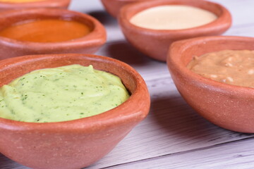 Mix of exotic and colorful sauces, spicy tropical flavors of the Colombian Pacific