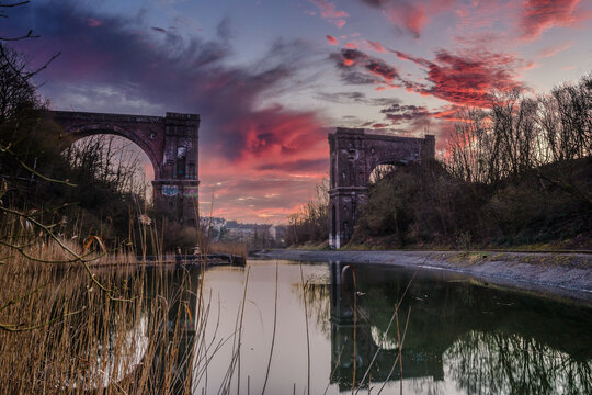 Dortmund, GERMANY - 19. March 2022: old viaduct at sunrise near the industrial area Phoenix West in Dortmund, Germany