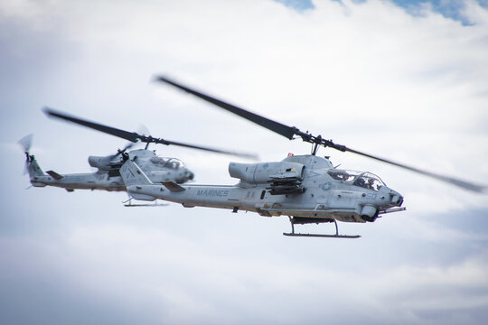 US Army Bell Cobra Military Combat Helicopter Formation In Action