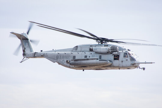 US Military CH-52 Sea Stallion transport helicopter formation landing in the combat area