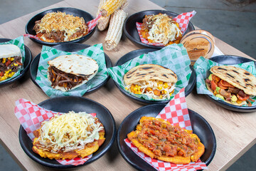 Mix of Colombian corn arepas, traditional flavors with meat, vegetables and cheese