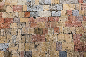 Old colored bricks texture background