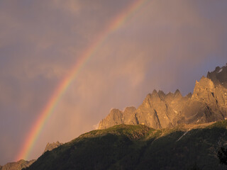 Rainy weather with rainbow over the French Alps