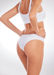 Bikini body all day, every day. Cropped shot of an unrecognizable woman standing in her underwear...