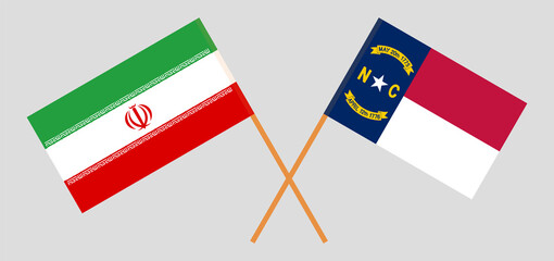 Crossed flags of Iran and The State of North Carolina. Official colors. Correct proportion