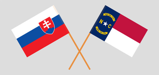 Crossed flags of Slovakia and The State of North Carolina. Official colors. Correct proportion