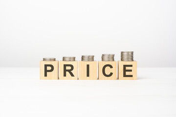 price - text written on wooden block with stacked coins on white background, growing trend