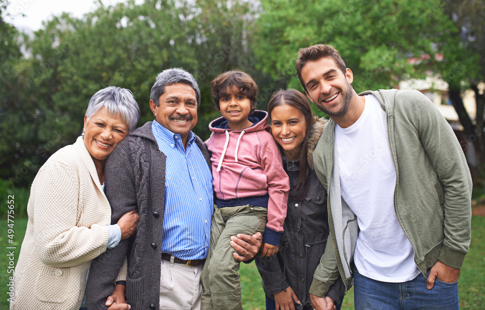 Poster Family is a little world created by love. Cropped shot of a multi-generational family.