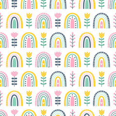 Rainbows and flowers seamless pattern. Summer kids vector background.