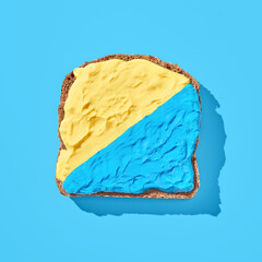 Bread with cream cheese with ukraine colours