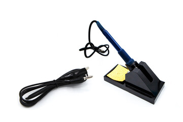 Soldering station and wire isolated and soldering ironon isolated on a white background.	