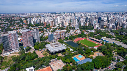 Fototapeta premium Aerial view of the city of São Paulo, Brazil. In the neighborhood of Vila Clementino, Jabaquara. Aerial drone photo. Avenida 23 de Maio in the background. Residential and commercial buildings