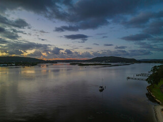 Sunrise and rain clouds waterscape