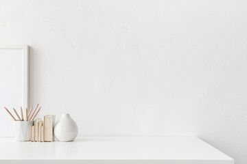 White desk with empty space. Bright stylish and minimal workspace. - obrazy, fototapety, plakaty