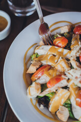 Chicken Salad Closeup with fork and honey