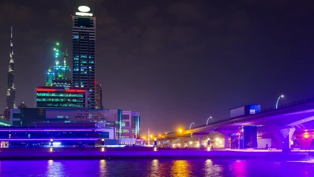 night illumination dubai city new creek traffic road panorama 4k time lapse uae