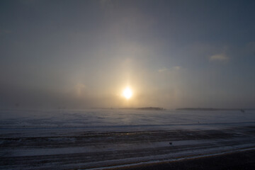 Fototapeta na wymiar Sunrise During Blizzard