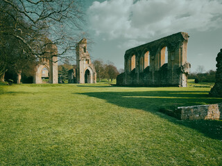 Glastonbury Town, old castle ruins, and Glastonbury Tor. English County in Somerset.