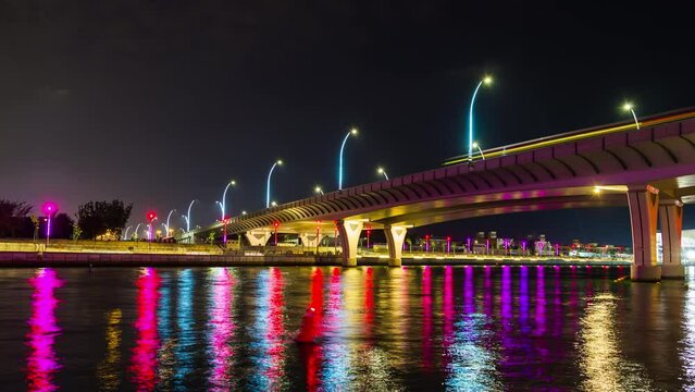 night illumination dubai famous creek traffic road fountain bridge panorama 4k time lapse uae