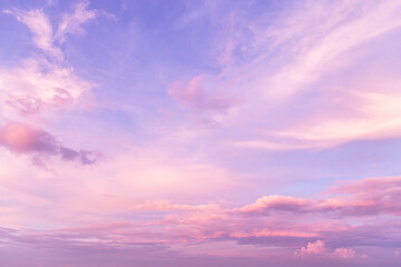 Pink purple violet cloudy sky. Beautiful soft gentle sunrise, sunset with cirrus clouds background texture	