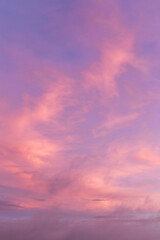 Pink purple violet cloudy sky. Beautiful soft gentle sunrise, sunset with cirrus clouds background texture