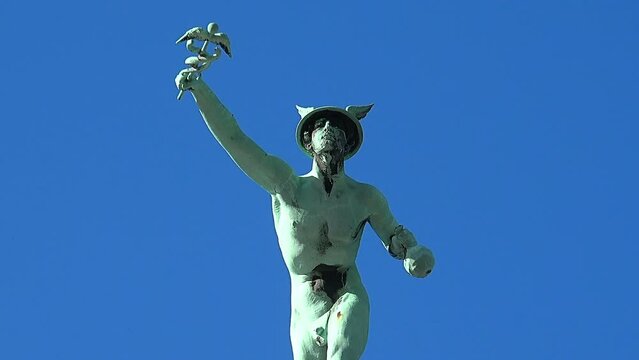 Sculpture of a naked man on the roof of the house. Copenhagen. Denmark.
