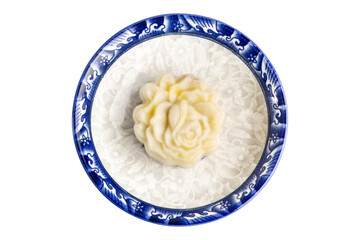 Traditional Thai Dessert, Homemade Steamed Banana in Coconut Milk or Steamed Banana Cake in exotic shape called Khanom Kluay in Thai, isolated on white background. Clipping path