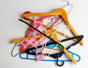 A wide variety of mixed hangers on white background