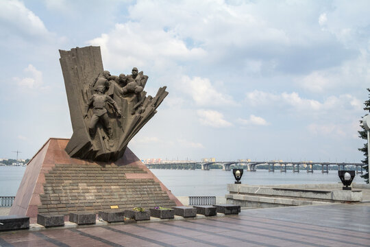 DNIPRO, UKRAINE - AUGUST 16, 2018: USSR Monument to soldiers killed in afghanistan during the soviet war with the dneper river in background in Dnipro...