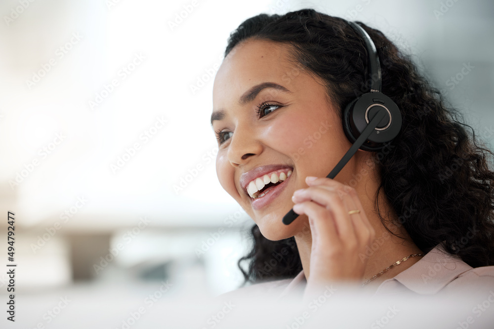 Poster its about creating a memorable experience for the customer. shot of a young call centre agent workin
