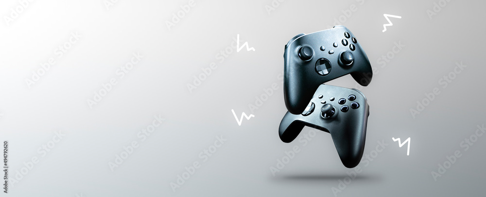 Poster 2 game controllers floating on gradient background - future of gaming concept