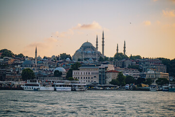 Fototapeta premium Panoramic photo taken from the river to the Blue Mosque at sunset in Istanbul Turkey