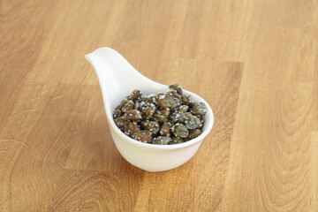 Salted marinated capers snack appetiser
