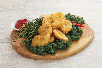 Crispy chicken nuggets with tomato ketchup