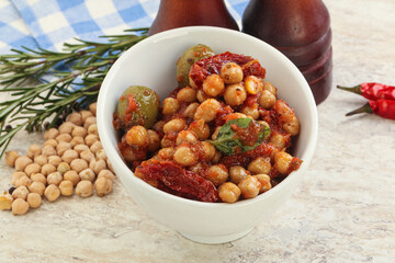 Chickpea beans with dry tomato and olives
