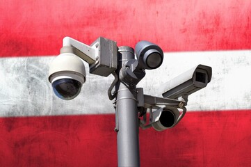 Closed circuit camera Multi-angle CCTV system against the background of the national flag of...