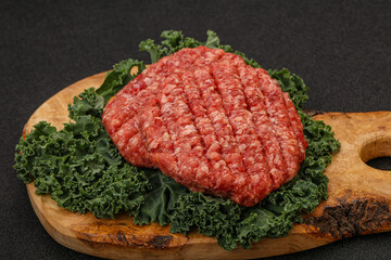 Raw beef burger cutlet for cooking